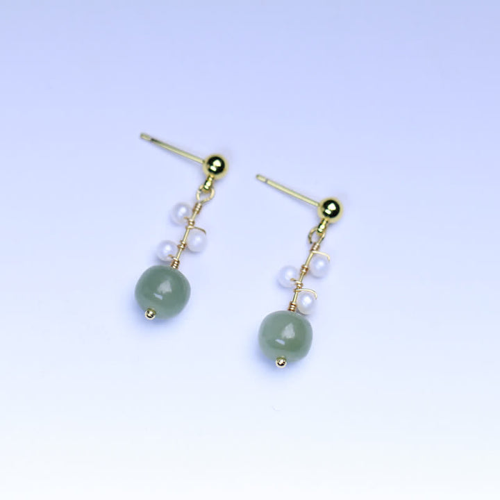 Orecchini pendenti con motivo floreale in giada Hetian placcati in oro 14K