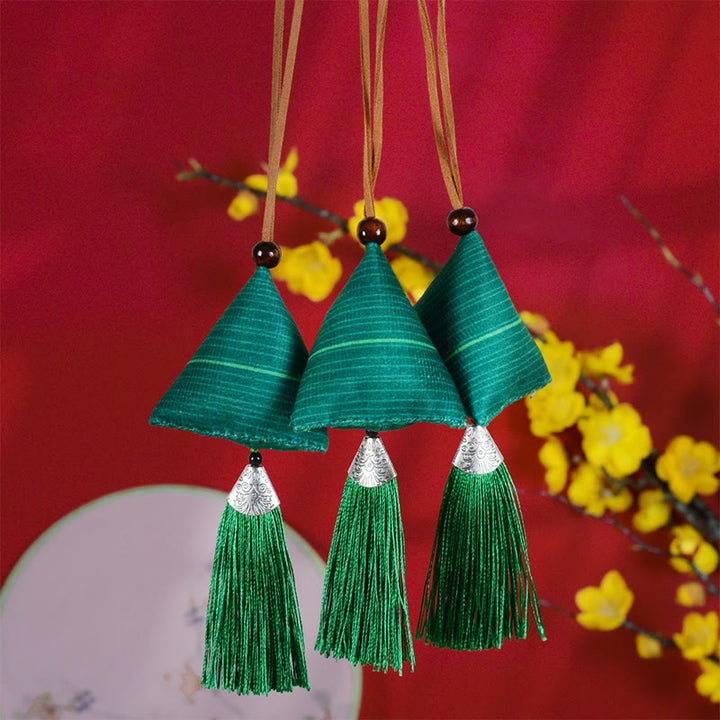 Decorazione appesa con nappa di protezione del sacchetto del modello Zongzi del festival delle barche drago Buddha Stones