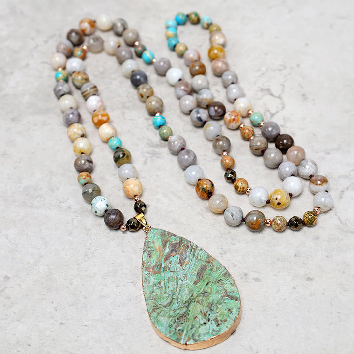 Collana di perline di guarigione in diaspro Picasso naturale dell'oceano Buddha Stones