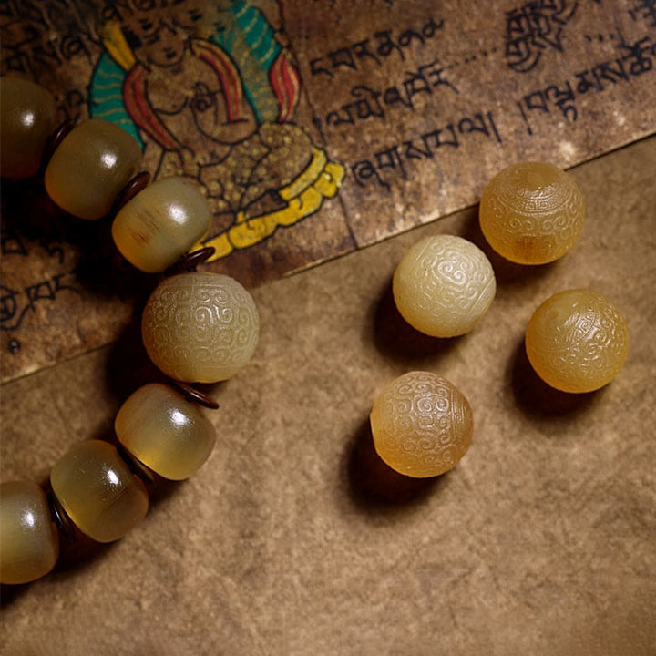 Braccialetto di auspicio Om Mani Padme Hum in corno di pecora tibetano fatto a mano con Buddha Stones