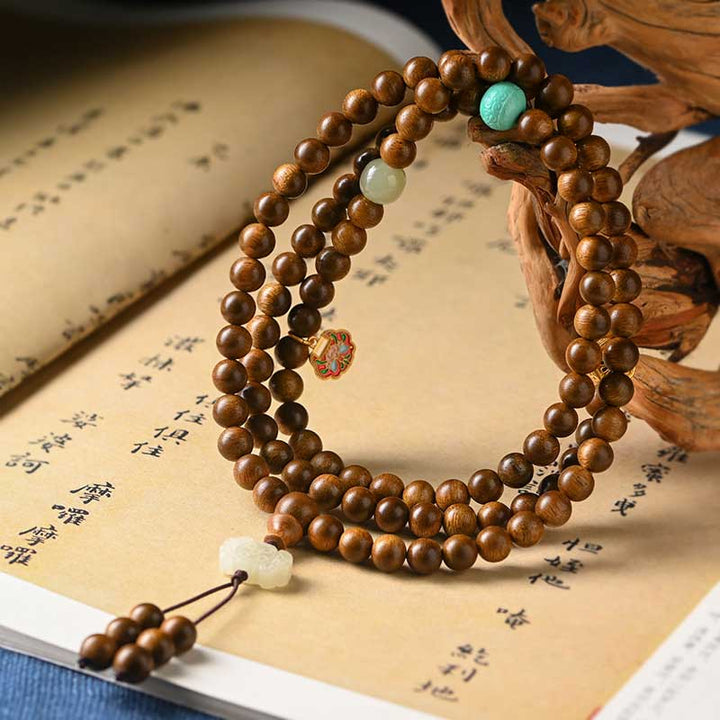 Braccialetto di protezione e calma in palissandro tibetano Buddha Stones Mala