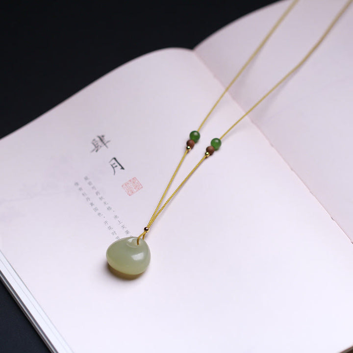 Collana con ciondolo in corda della prosperità con motivo a piccola borsa in giada naturale di Hetian