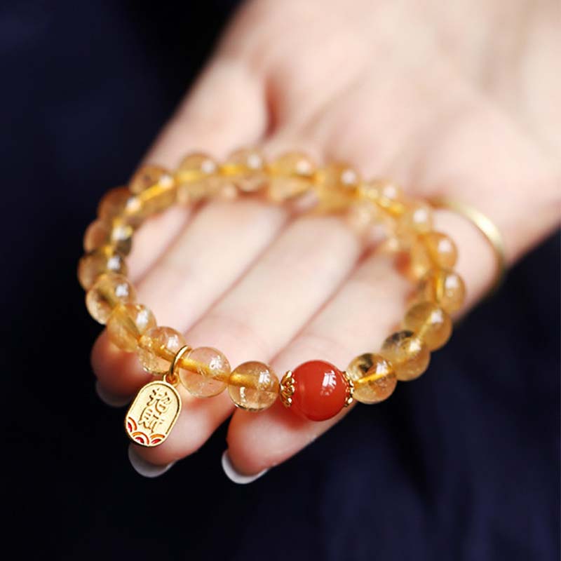 Braccialetto con ciondolo della fortuna in agata rossa e citrino Buddha Stones