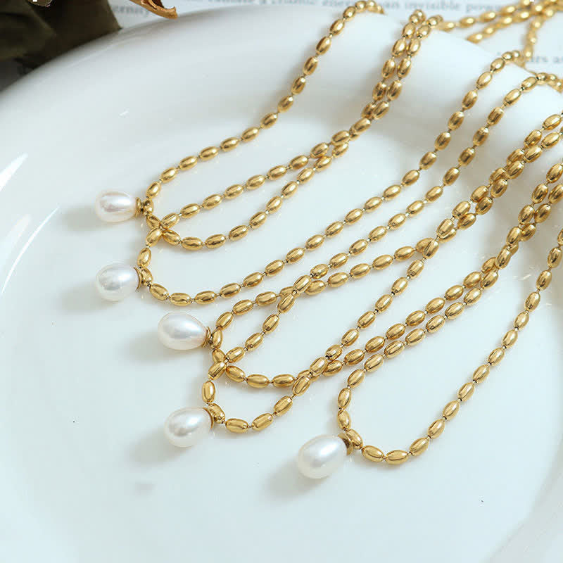 Collana con ciondolo di perle e perle della pace