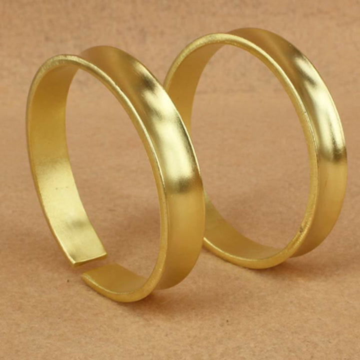 Bracciale rigido in rame con simbolo di ricchezza e fortuna