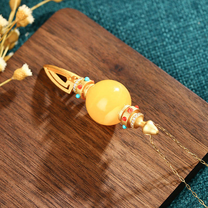 Collana con ciondolo ansia trasparente Dorje Vajra in ambra placcata oro 24K