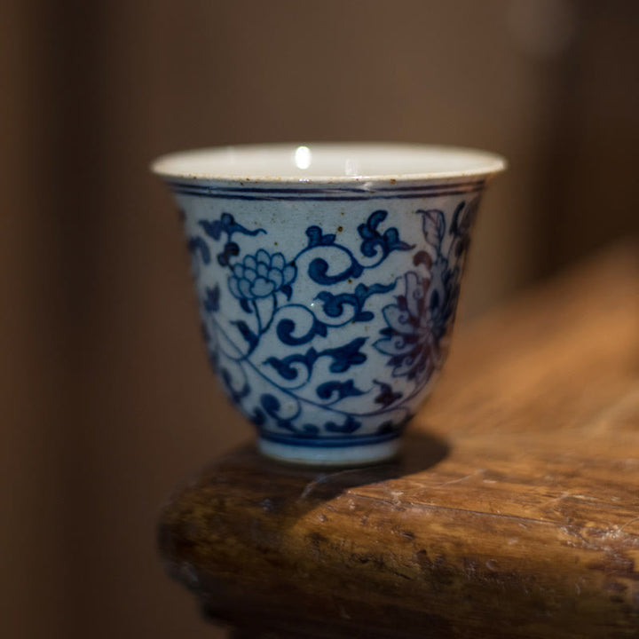 Buddha Stones Jingdezhen porcellana blu e bianca dipinta a mano fiore di loto prugna tazza da tè in ceramica tazze da tè Kung Fu