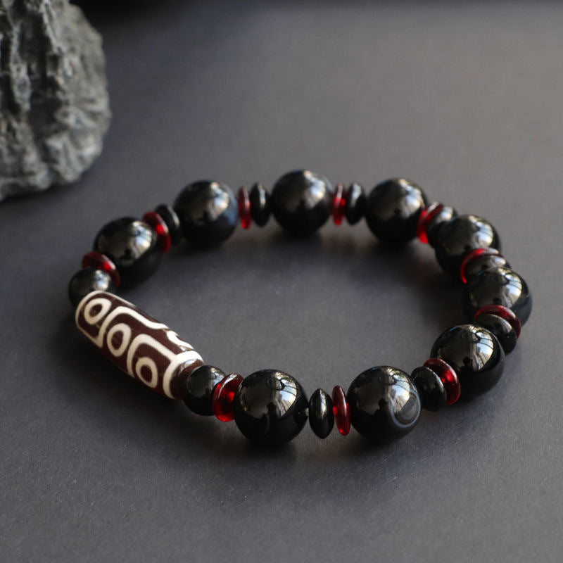 Braccialetto di protezione della ricchezza con perline Dzi a nove occhi in onice nero Buddha Stones