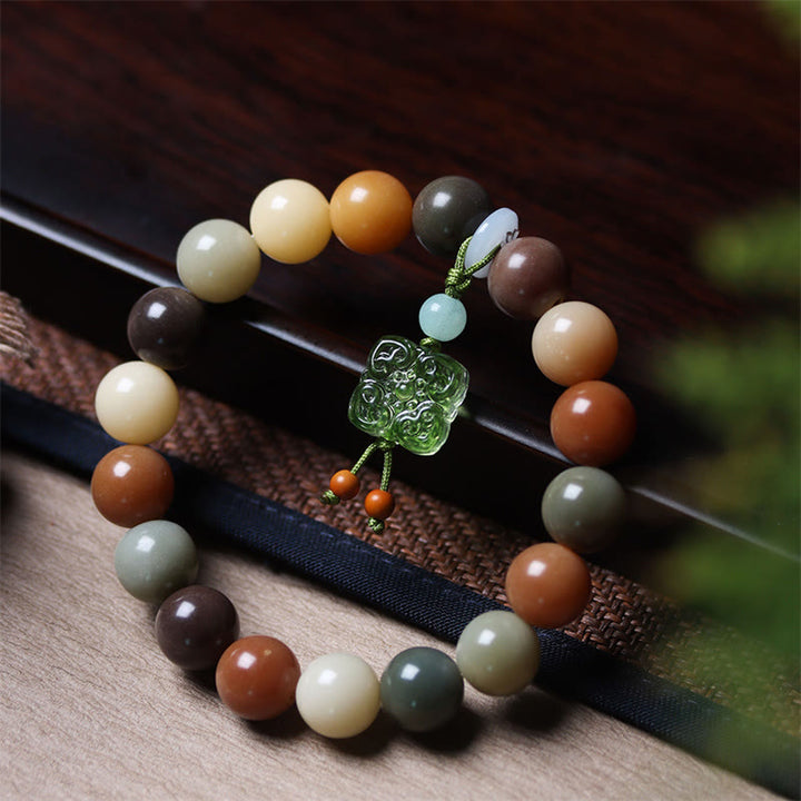 Braccialetto della pace con ciondolo in vetro Liuli con semi di Bodhi multicolore sfumato naturale Buddha Stones