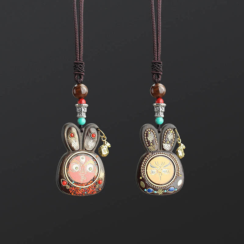 Collana pendente Thangka con cinque divinità della ricchezza in ebano tibetano