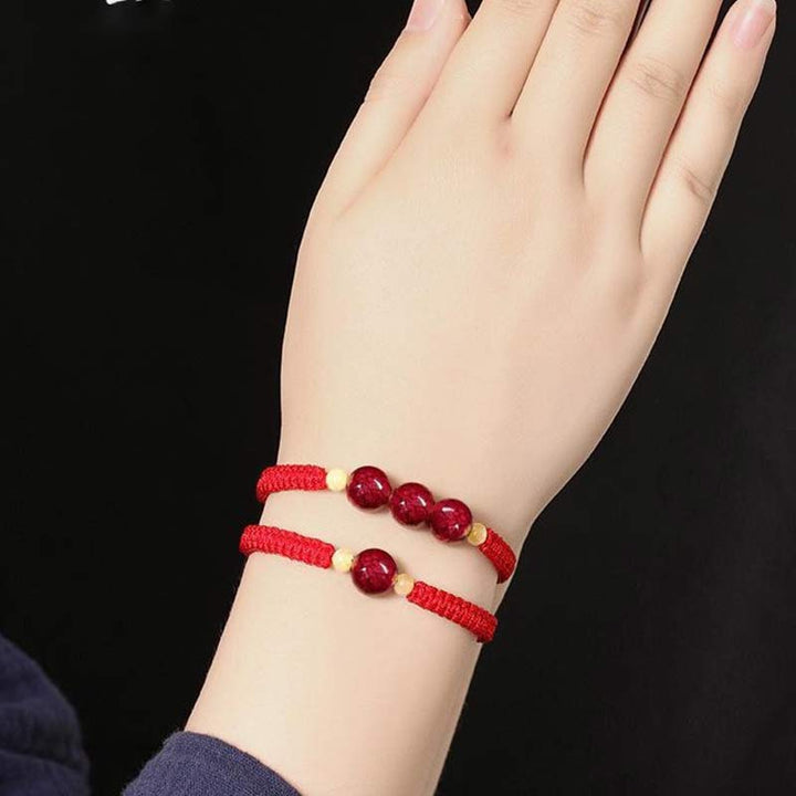 Braccialetto rosso con corda e cinabro per bambini, con Buddha Stones