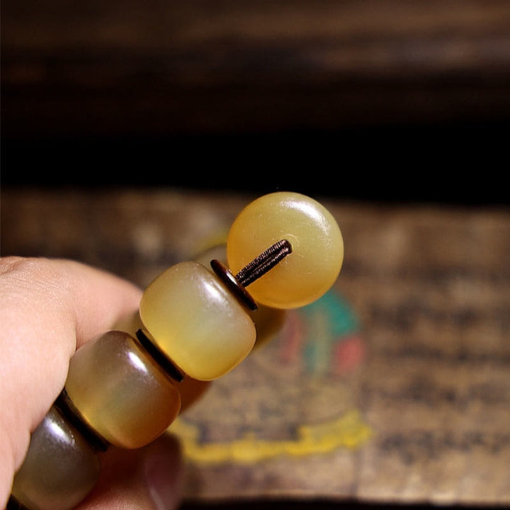 Braccialetto di auspicio Om Mani Padme Hum in corno di pecora tibetano fatto a mano con Buddha Stones