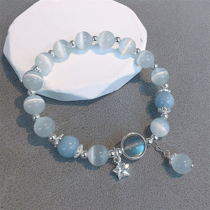 Braccialetto di supporto con ciondolo a forma di stella a forma di farfalla, pietra di luna e occhio di gatto Buddha Stones