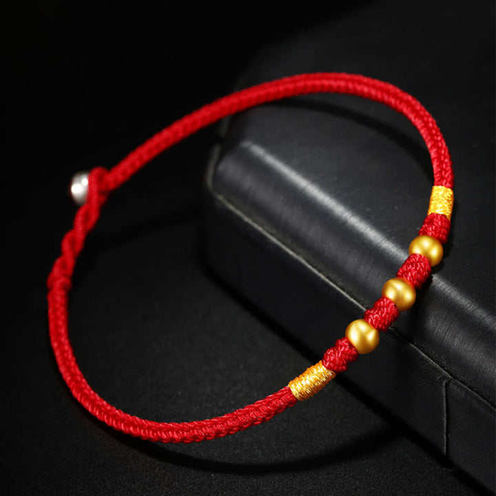 Braccialetto di protezione intrecciato fatto a mano con nodo King Kong, perline d'oro 999 Buddha Stones