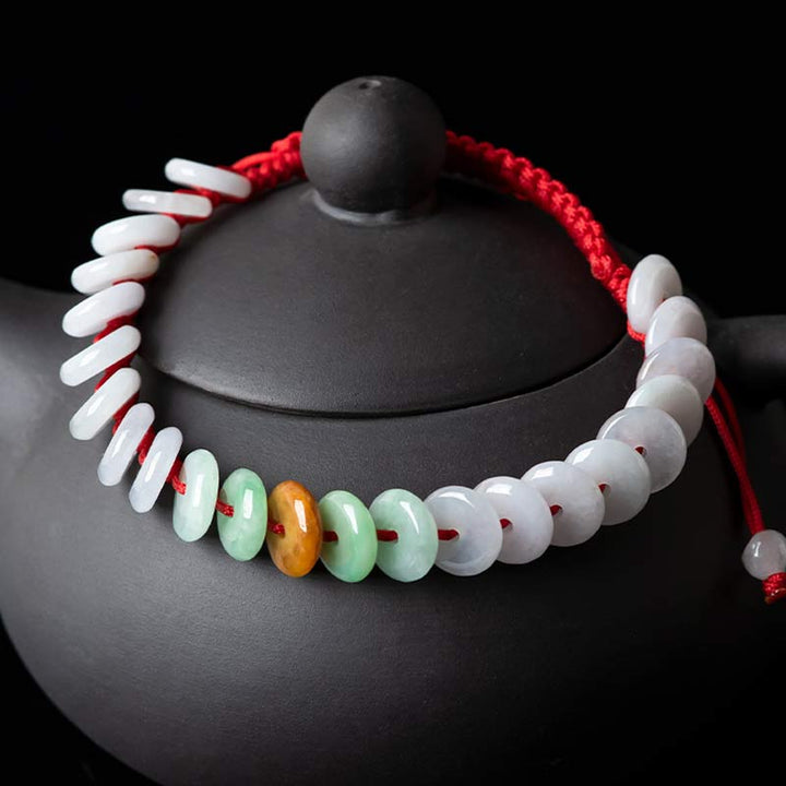 Braccialetto intrecciato con corda rossa portafortuna in giada rotonda Buddha Stones