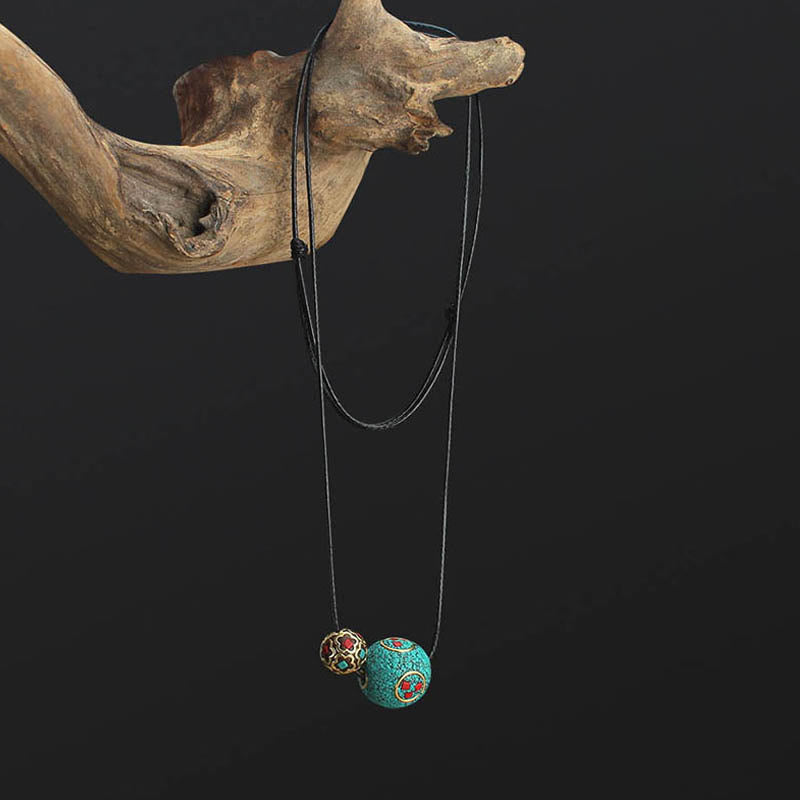 Collana con ciondolo con doppia perla turchese tibetana Buddha Stones, protezione e forza