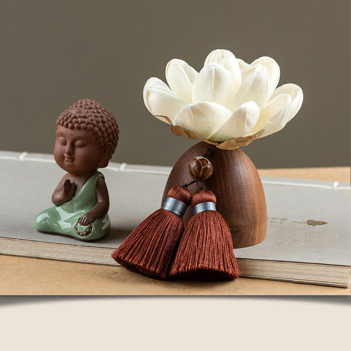 Decorazione di cura calma con fiore di Buddha in legno di pesca nera