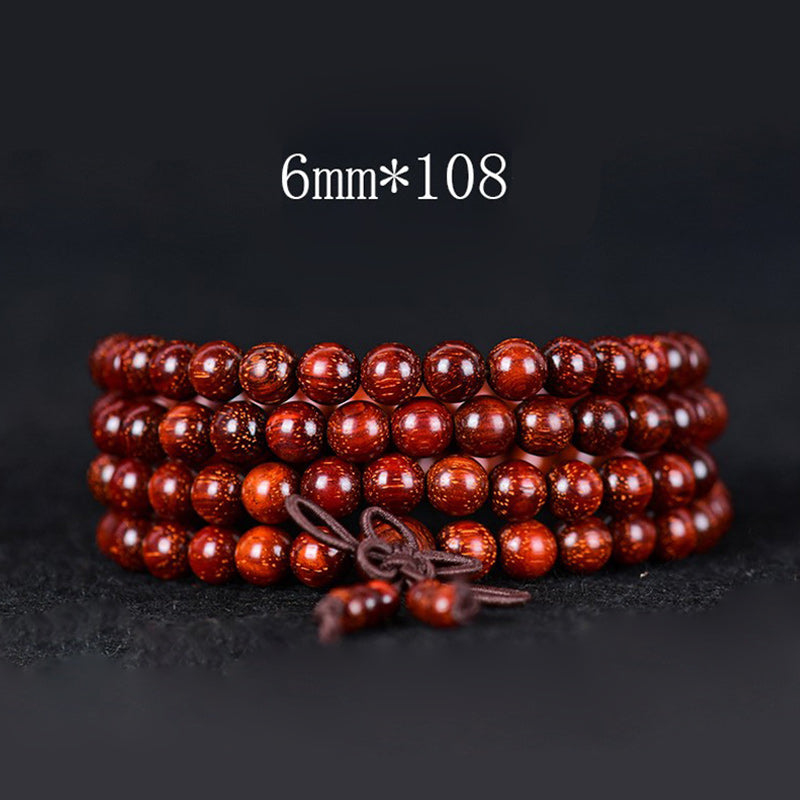 Braccialetto di equilibrio in legno di sandalo rosso con foglia piccola tibetana Buddha Stones