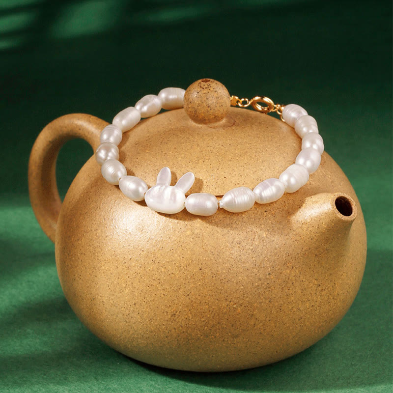 Braccialetto di sincerità con coniglio carino e perle naturali Buddha Stones