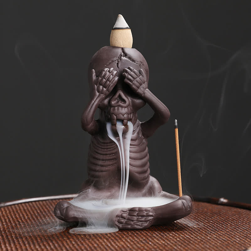 Buddha Stones Piccolo teschio Fantasma Argilla viola Fontana di fumo a riflusso Bruciatore di incenso della pace Decorazione