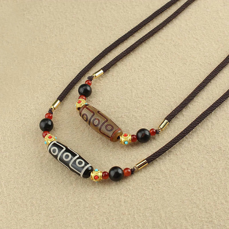 Buddha Stones Tibetano Nove Occhi Dzi Bead Protezione Benedizioni Collana Pendente