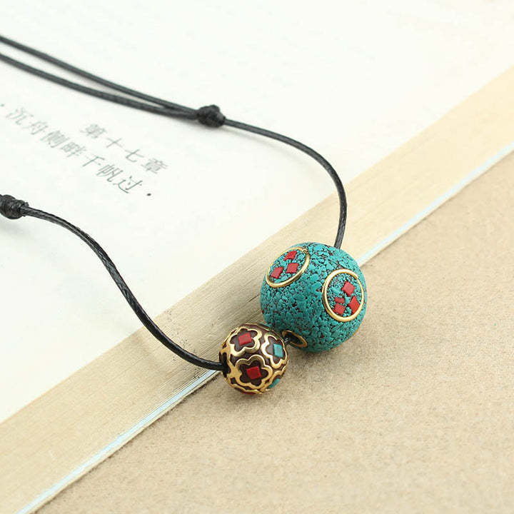 Collana con ciondolo con doppia perla turchese tibetana Buddha Stones, protezione e forza
