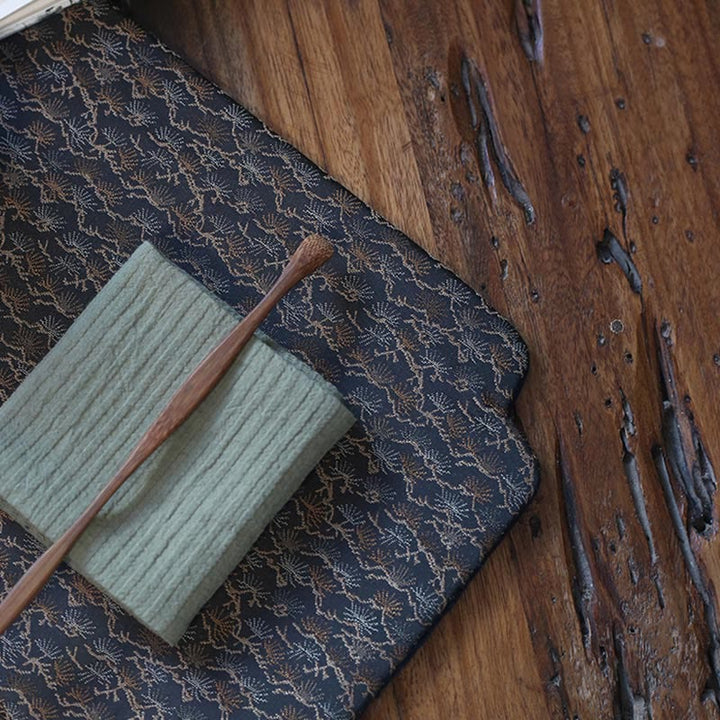Elegante sottobicchiere per tazza da tè con motivo broccato floreale