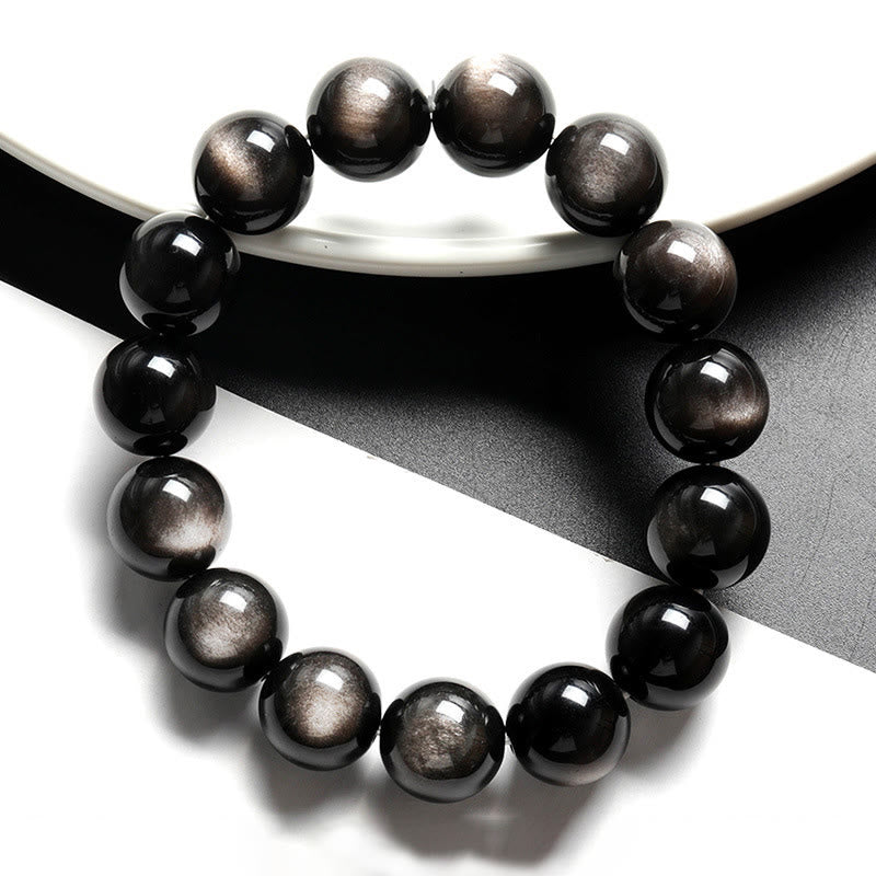 Braccialetto di protezione lenitiva in ossidiana lucida d'argento naturale Buddha Stones