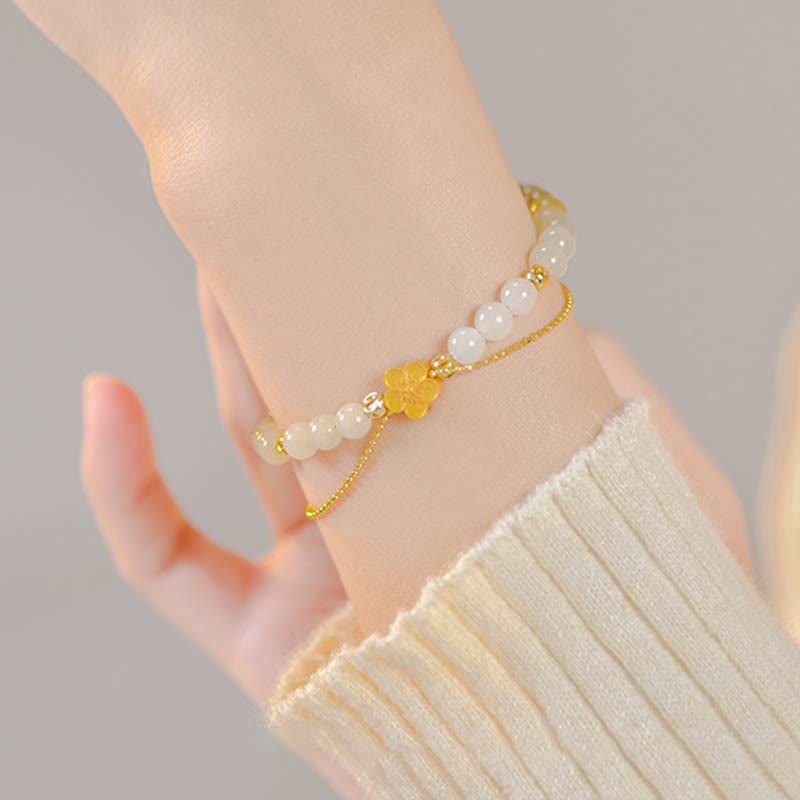 Bracciale Buddha Stones in argento sterling 925 con giada naturale Hetian e fiori di pesco