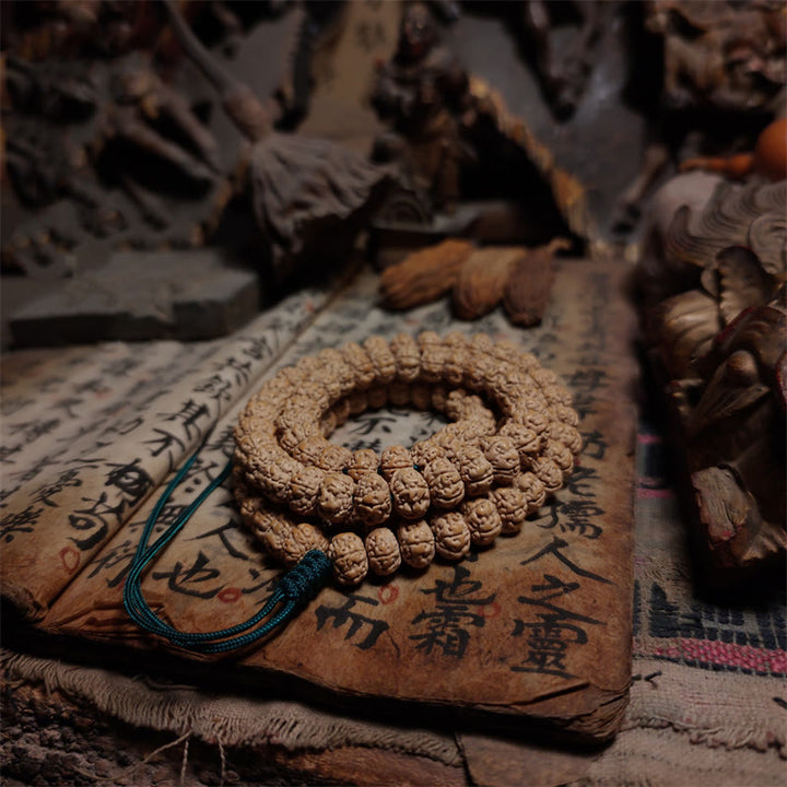 Braccialetto a quattro giri con 108 perle Mala Rudraksha Bodhi Seed Luck Wealth Tassel