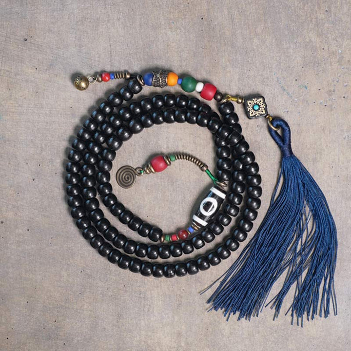 Buddha Stones 108 Perline Mala Legno di Ebano Dzi Perline Rame Braccialetto con Nappa