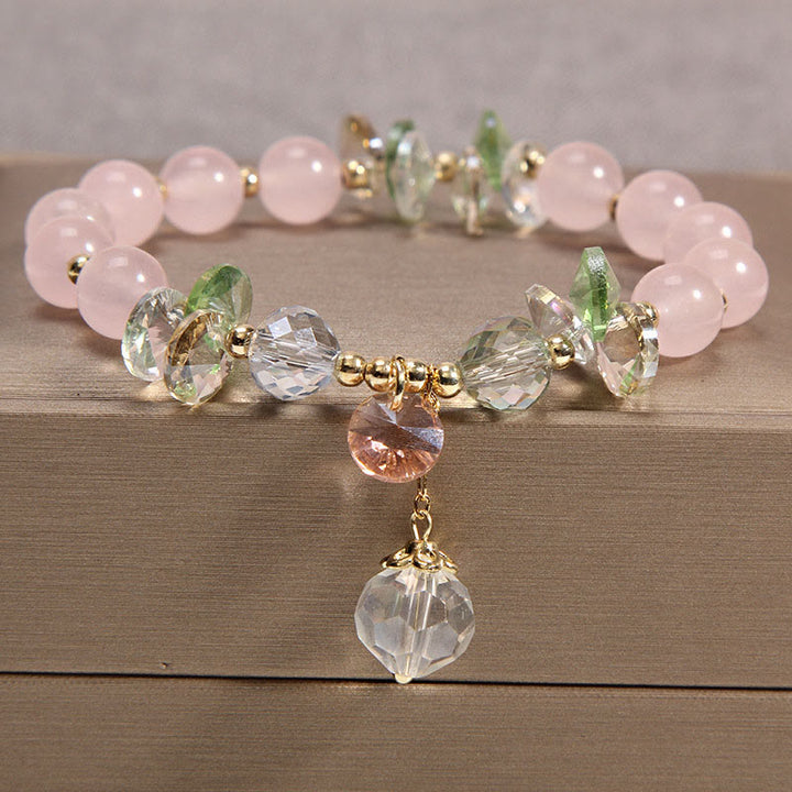 Braccialetto con ciondolo di pace in cristallo rosa con occhio di gatto Buddha Stones - Cristallo rosa - image 1