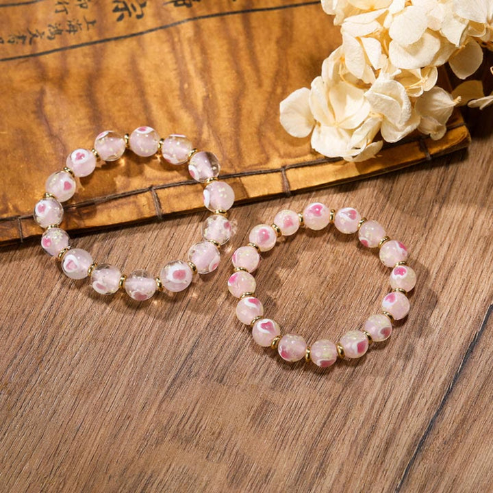 Buddha Stones Oro Deglutizione Bestia Famiglia Ciondolo Luminoso Rosa Cuore Amore Fluorescente Liuli Perline di Vetro Braccialetto Benedizioni