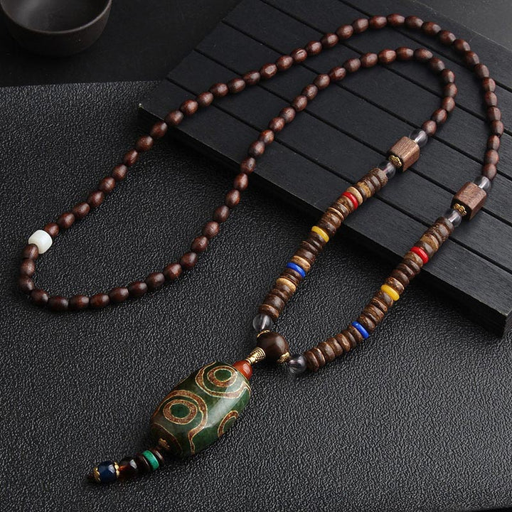 Collana di meditazione in legno di wenge con perline di Dzi in turchese Buddha Stones