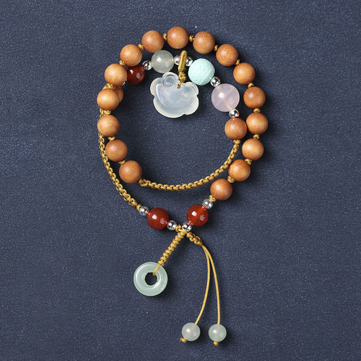 Braccialetto a doppio giro rilassante con fibbia della pace, ciondolo in legno di sandalo verde e calcedonio Buddha Stones