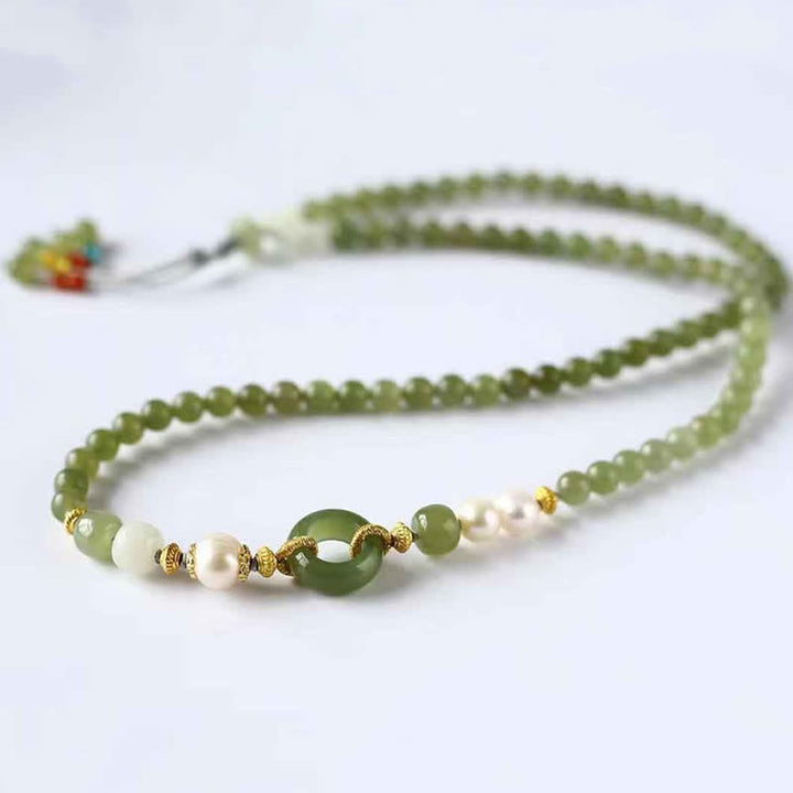 Braccialetto di corda con fibbia della pace, perle di giada Hetian, pietre Buddha Stones e ricchezza