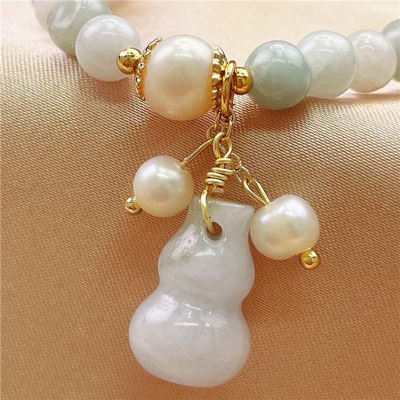 Braccialetto con ciondolo di protezione e benedizione in giada Buddha Stones