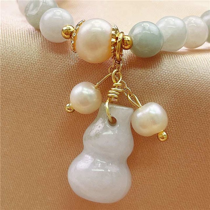 Braccialetto con ciondolo di protezione e benedizione in giada Buddha Stones