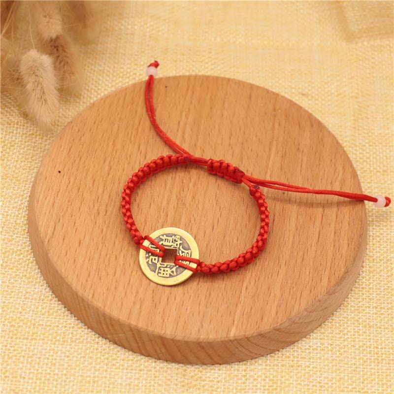 Braccialetto intrecciato con corda rossa, moneta di rame e Buddha Stones