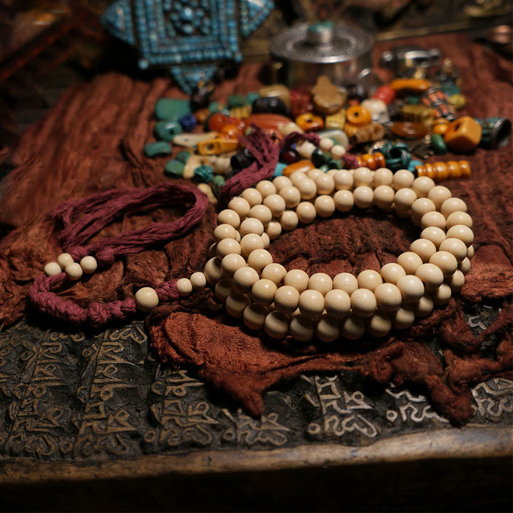 Buddha Stones 108 Mala Perle Abelia Biflora Legno Allontanando gli Spiriti Maligni Polso Mala