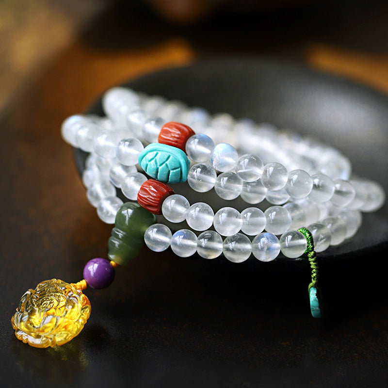 Braccialetto Mala con 108 perle di Buddha Stones , ambra, loto e turchese, per la guarigione con cristalli. - image 1