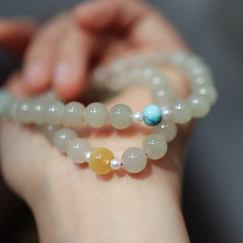 Braccialetto a doppio giro con fibbia della pace in giada Hetian in argento sterling 925 Buddha Stones Lotus Luck
