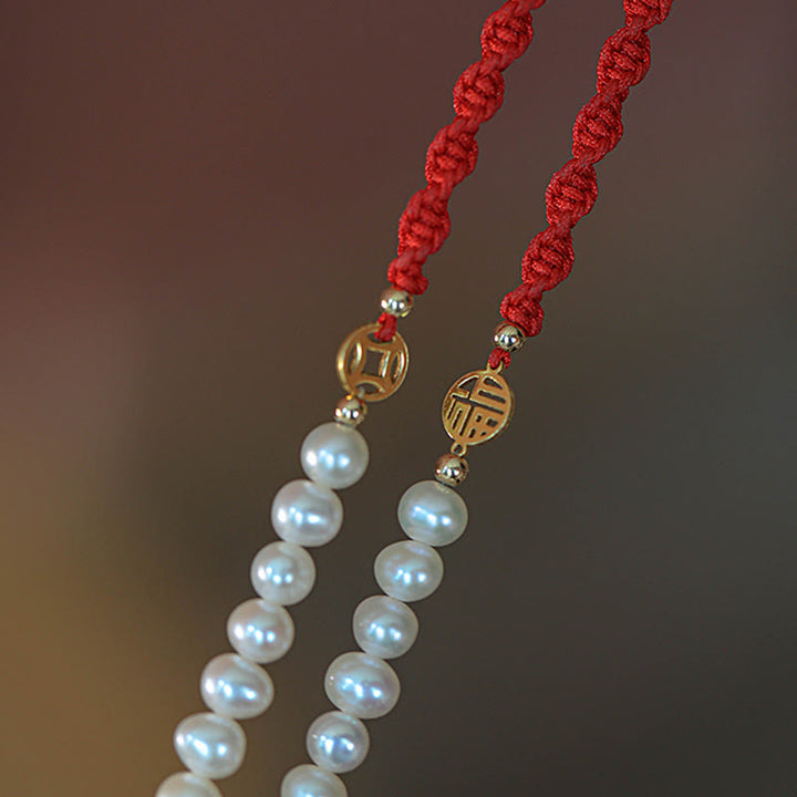 Braccialetto con treccia rossa e perle placcate in oro 14K e protezione dalla fortuna