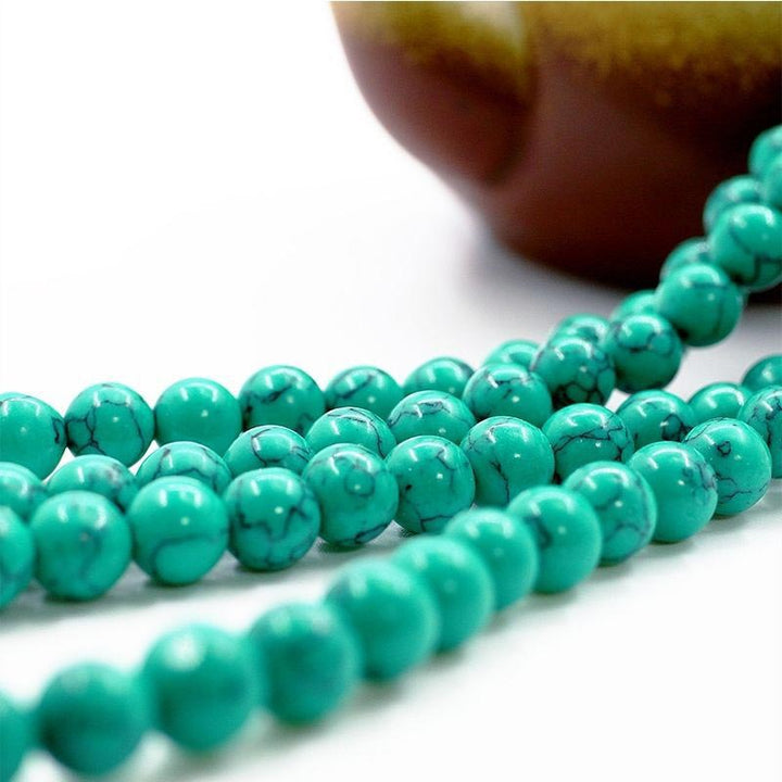Collana di purificazione Mala in turchese tibetano Buddha Stones