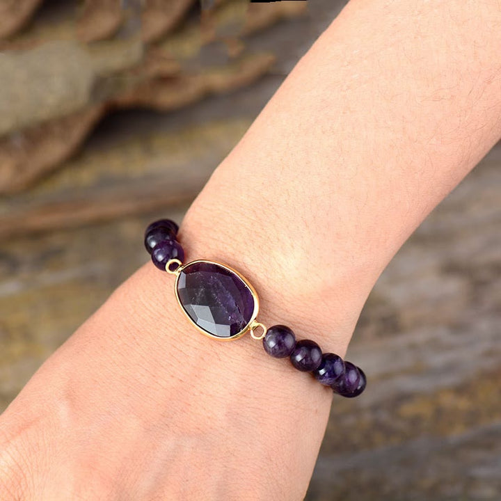 Bracciale Buddha Stones con motivo a marquise in cristallo di ametista naturale