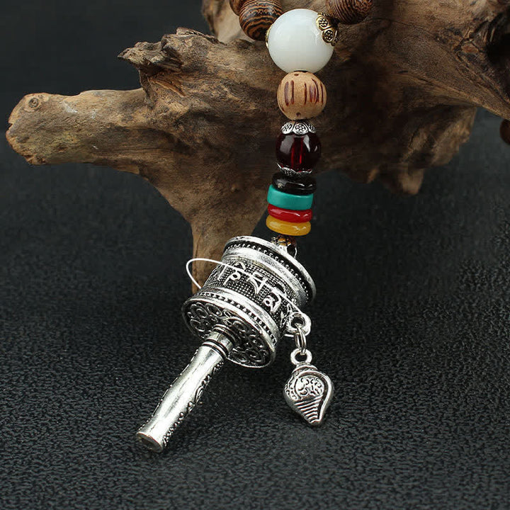 Buddha Stones Tibetano Om Mani Padme Hum Ruota della Preghiera Rotazione Vajra Collana Pendente in Legno - image 17