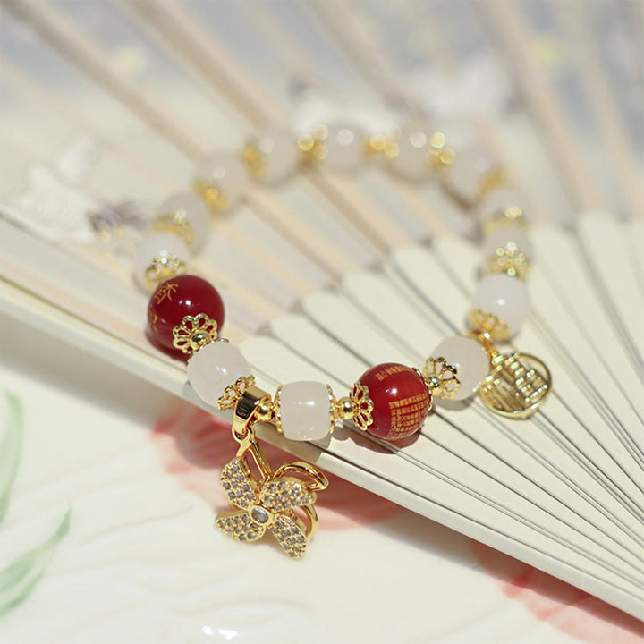 Braccialetto di benedizione con ciondolo a forma di lucchetto cinese con mulino a vento Buddha Stones Fu Character