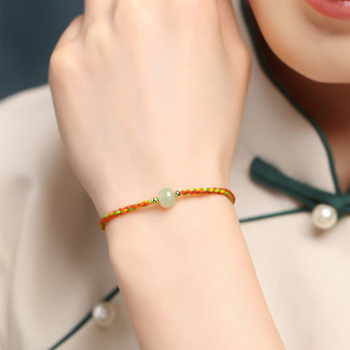Braccialetto di abbondanza di perline di giada con corda colorata Buddha Stones Luck