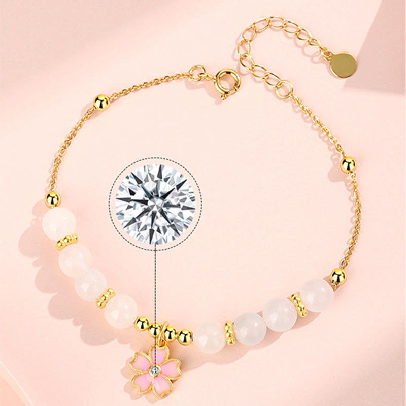 Braccialetto di protezione in giada bianca Hetian con fiori di ciliegio in argento sterling 925 Buddha Stones