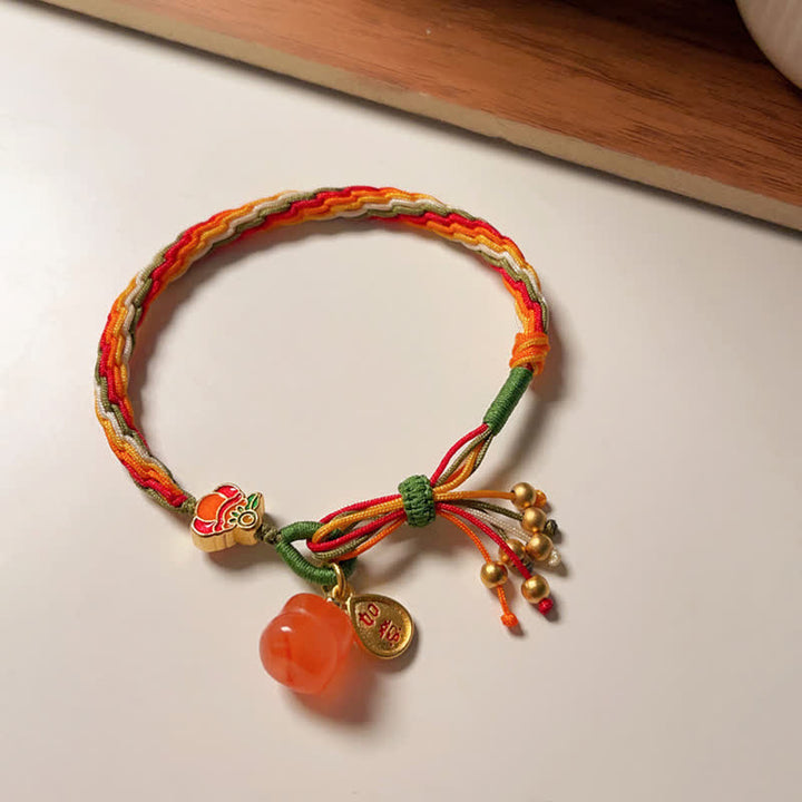 Braccialetto con corda intrecciata con nodo di reincarnazione in agata rossa e cachi Buddha Stones